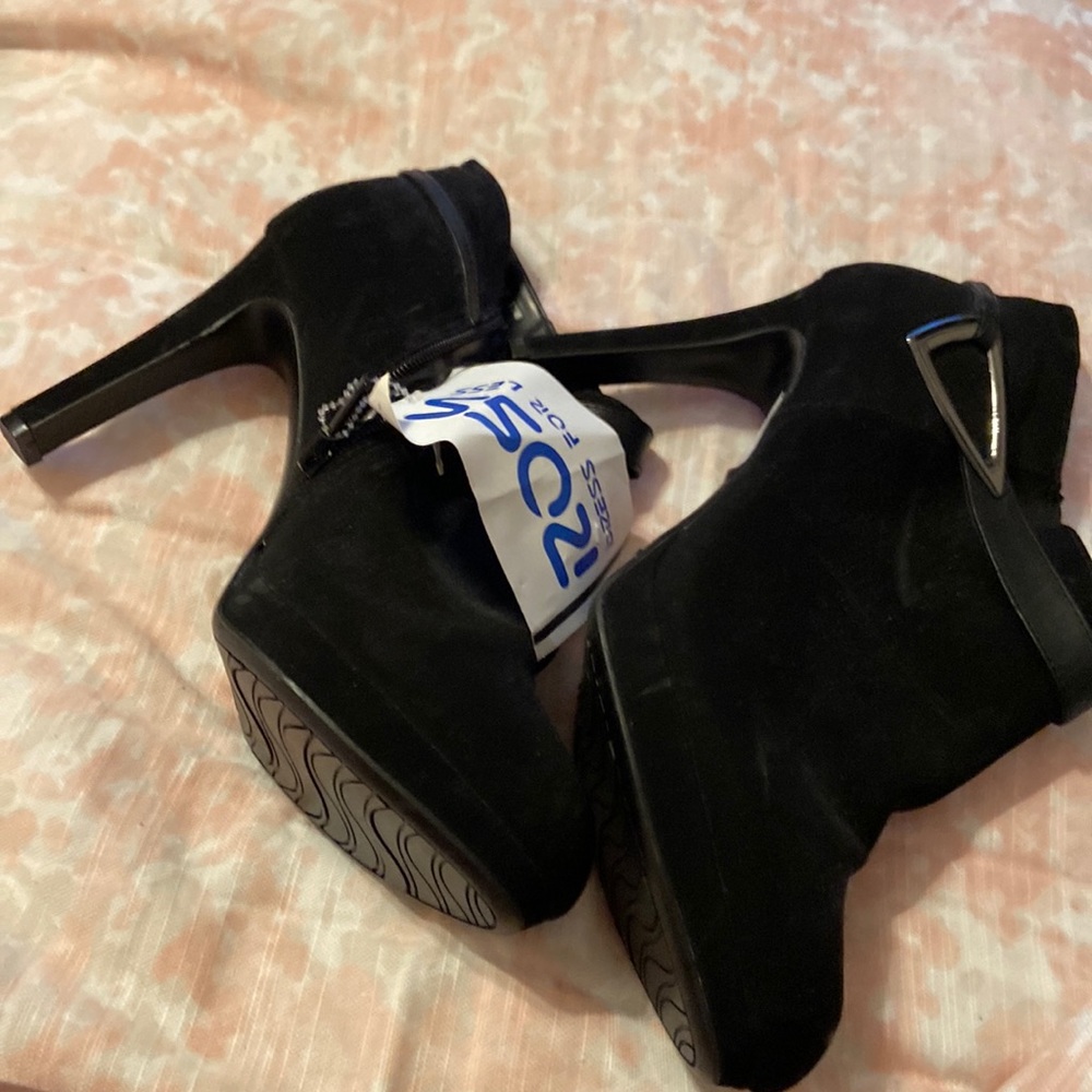 Never worn heeled booties